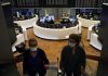 European shares rise on economic awakening; oil and gold jump