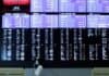 Asian shares subdued as S&P slips, virus surges