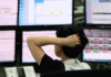 Asia-Pacific markets trade mixed, Singapore’s major bank stocks fall