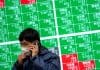 Asia shares slip, Nikkei stalls near 30-year high