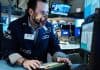 Global markets slump on hawkish Fed minutes; tech rout spills into Europe