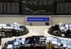 European stocks close higher as euro hovers close to dollar parity; EDF shares up 6%