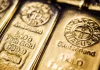 Gold steadies near 9-month peak on hopes of slower Fed rate hike