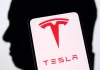 Tesla reports record quarterly deliveries but misses estimates