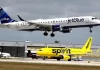 DOJ sues to block $3.8B JetBlue-Spirit Airlines merger, saying it will mean higher fares for customers