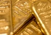 Gold ekes out gains as US dollar, yields ease