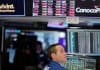 Wall St ends slightly higher after Fed policymakers back rate cuts
