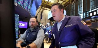 Equities end higher after choppy trade as earnings, data, tariffs gauged