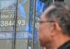 Asian shares, US futures gain as Japan keeps its key interest rate unchanged