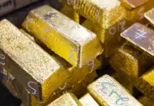 Gold Retreats as Strong US Jobs Report Dims Rate-Cut Prospects