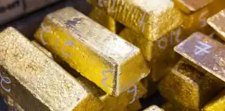 Gold Retreats as Strong US Jobs Report Dims Rate-Cut Prospects